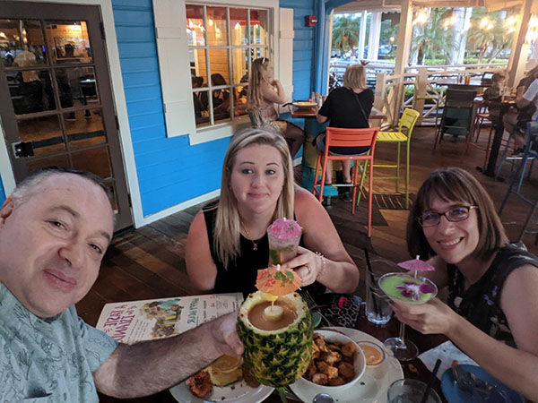 Fun Fact: community leadership members Denise, Igal, and Lorrin enjoy umbrella drinks