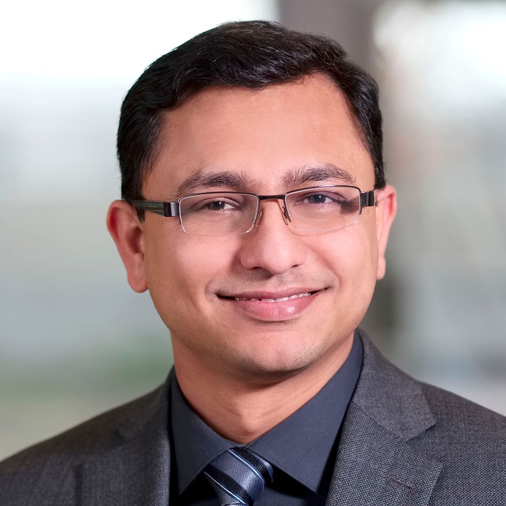 Formal headshot (1000x1000).jpg